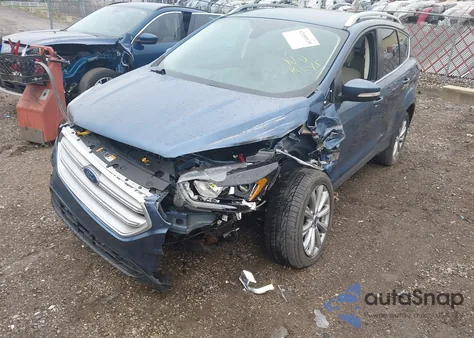 2018 Ford Escape Titanium из США, поврежденный, VIN 1FMCU9J92JUC75426